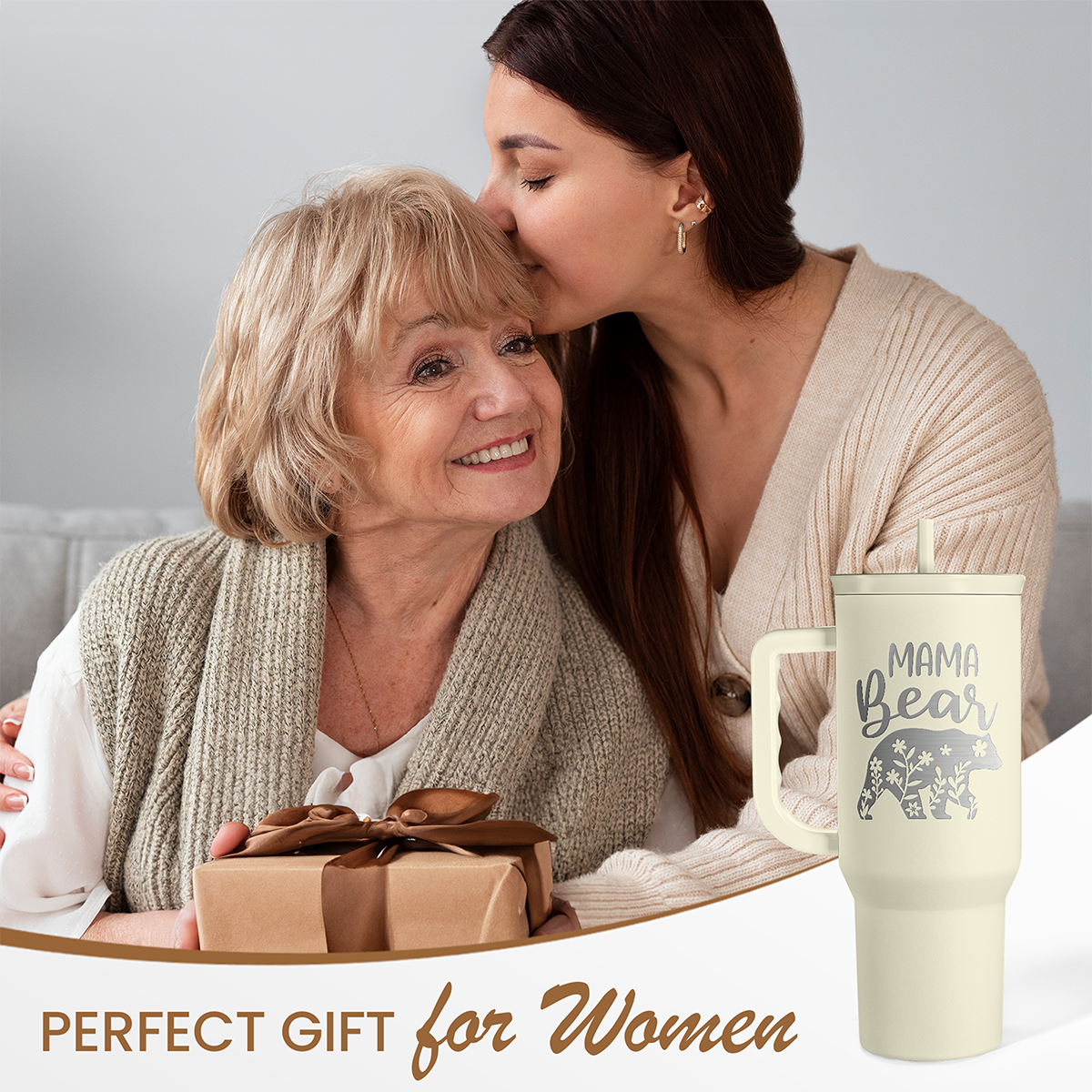 Beige 40oz mama bear tumbler with handle, straw, standing on a gift table.