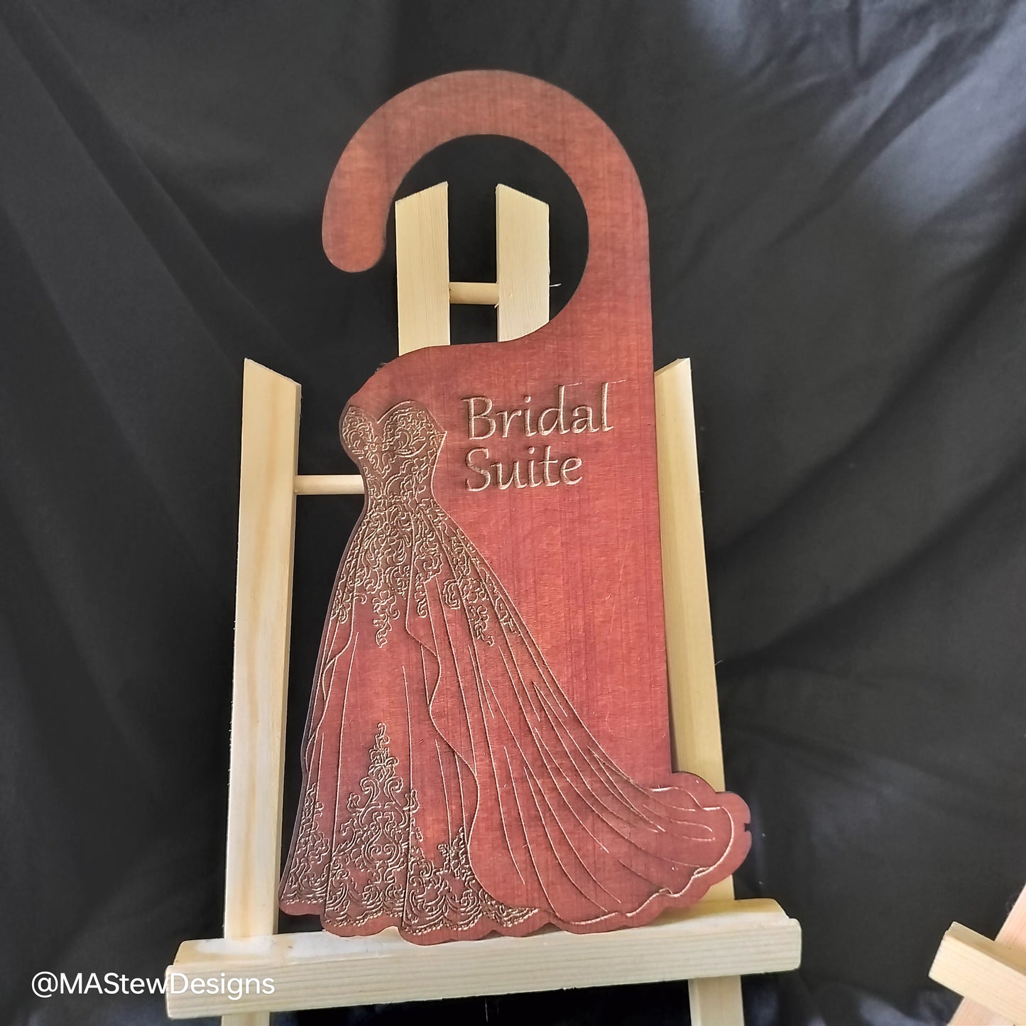 Wood door hanger with bridal gown silhouette and 'Bridal Suite' text.