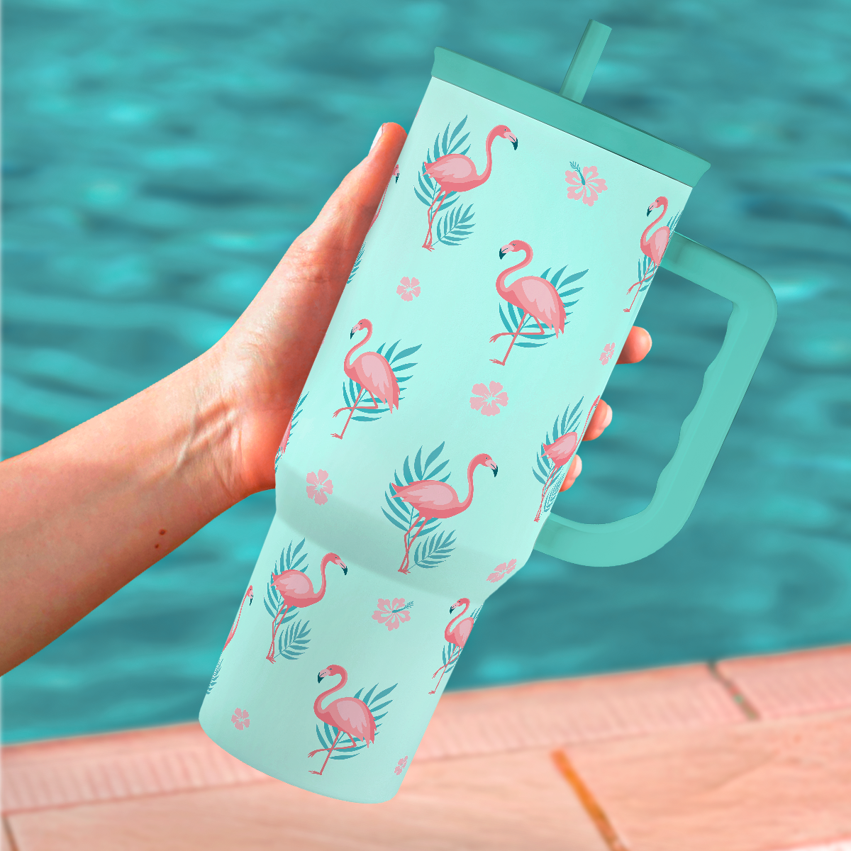 Mint Slidemate tumbler with handle and straw, pink flamingo pattern, close-up