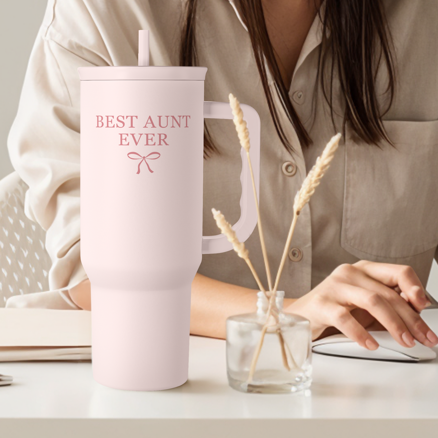 Pink 40oz tumbler with handle and straw, “Best Aunt Ever” print on front