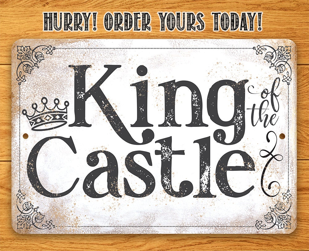 King of the Castle metal sign with crown and black vintage lettering, distressed finish