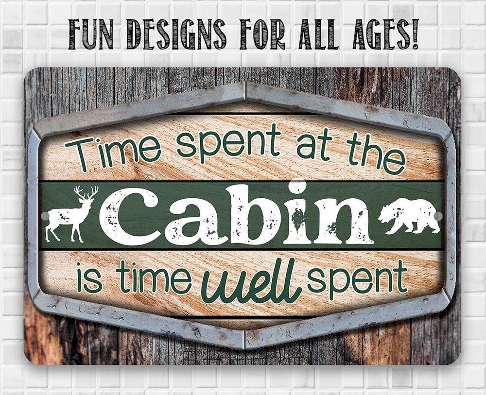 Cabin metal sign with fun design text “Fun designs for all ages” and green “Cabin” panel