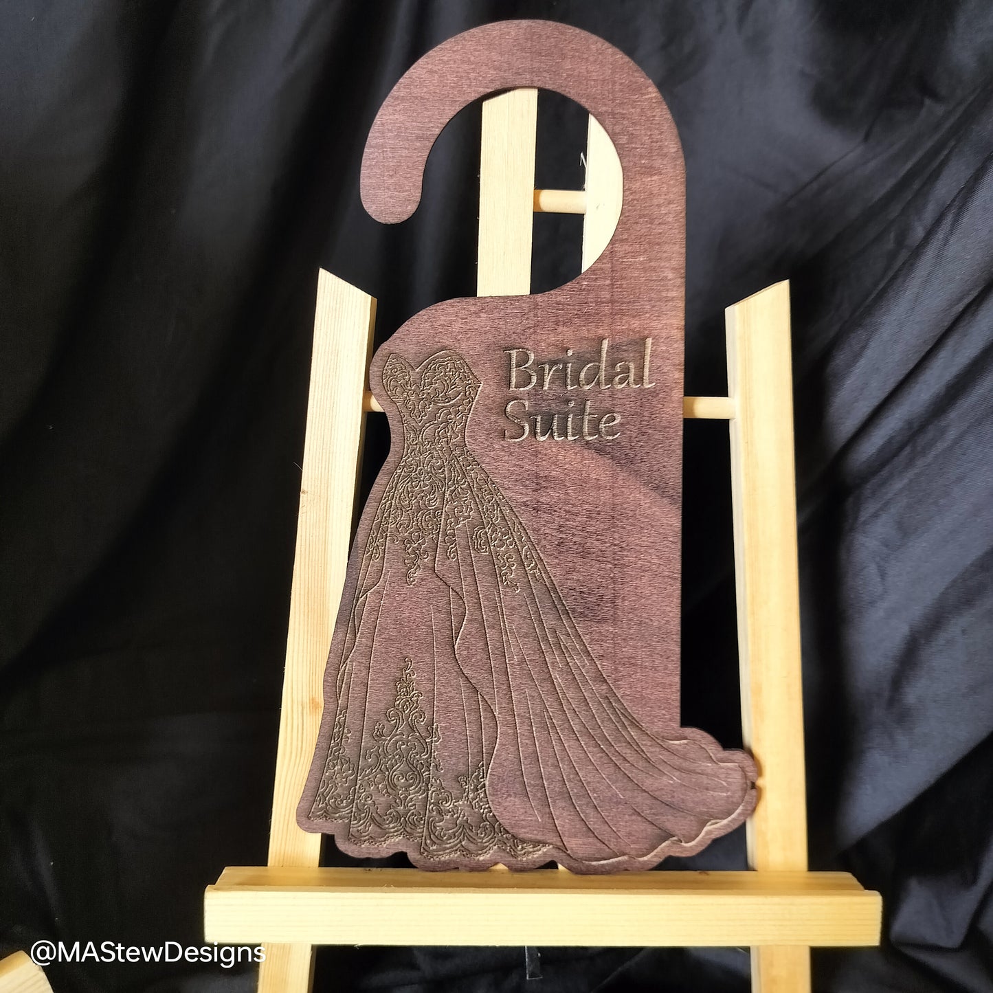 Wood door hanger with bridal gown silhouette and 'Bridal Suite' text.