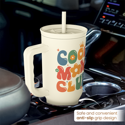 Beige 40oz slider tumbler with handle and straw on car interior, anti-slip grip