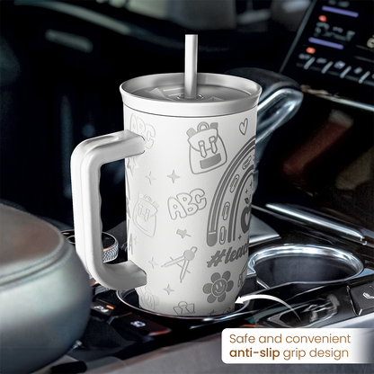 White 40oz tumbler with handle, teacher-themed print, and curved anti-slip grip
