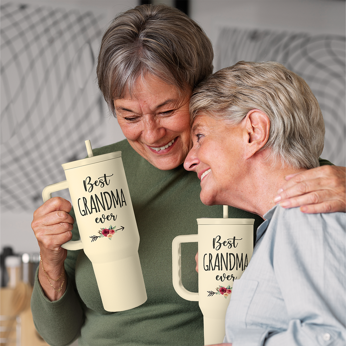 Two cream 40oz tumblers with handle and straw, “Best Grandma ever” print
