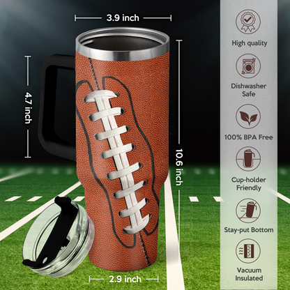 Brown football tumbler with handle, black lid, stainless rim and white lace pattern