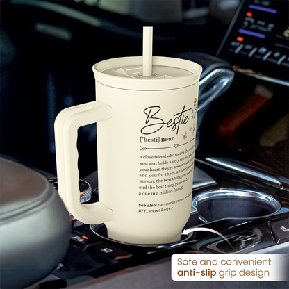 Beige 40oz tumbler on a vehicle dashboard with handle and straw; anti-slip grip
