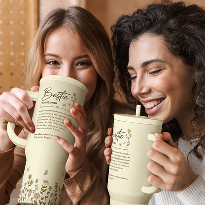 Beige 40oz tumbler with handle and straw, floral print; two people drinking