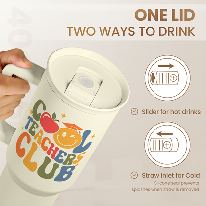 Beige lidded tumbler with sliding top and straw inlet, Teachers Club graphic