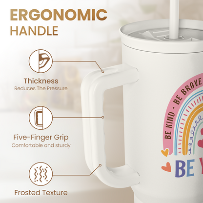 White 40oz slider tumbler close-up showing ergonomic handle and “BE YOU” front design.
