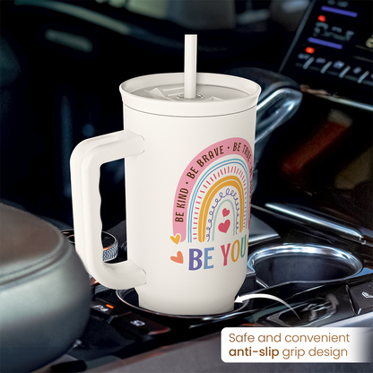 White 40oz slider tumbler with handle and anti-slip grip base; “BE YOU” artwork.