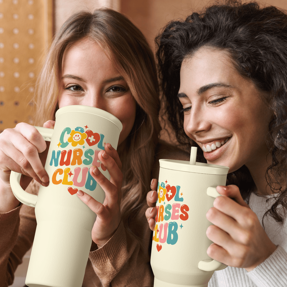 Beige 40oz Nurses Club tumbler with handle and straw, held by two women