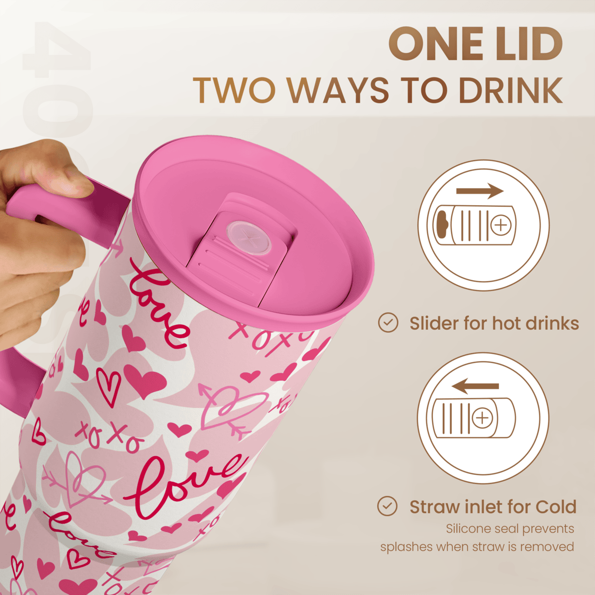 Pink 40oz tumbler with slider lid and straw inlet, white with pink hearts love pattern.