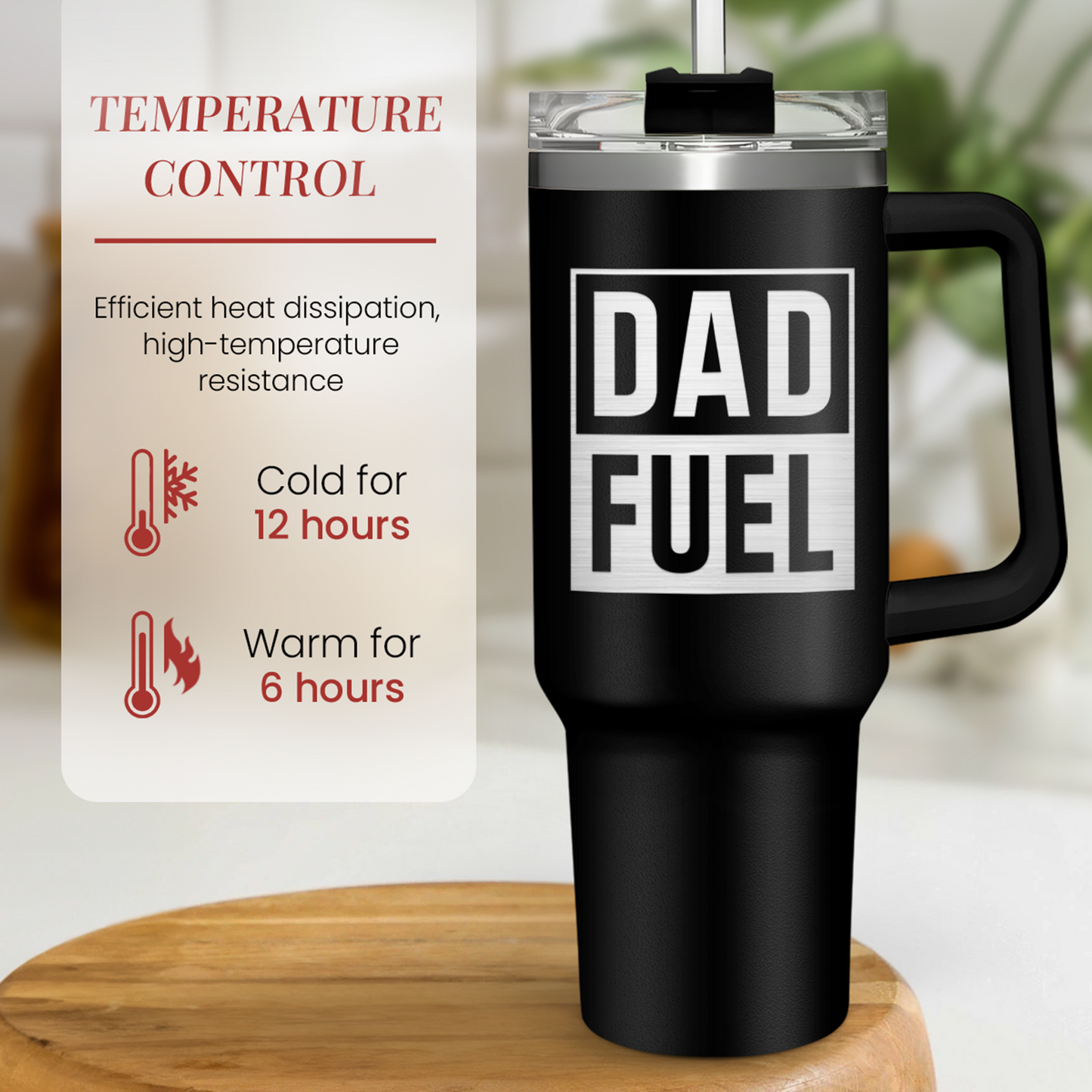 Black 40oz tumbler with handle and DAD FUEL graphic, clear lid on wooden table