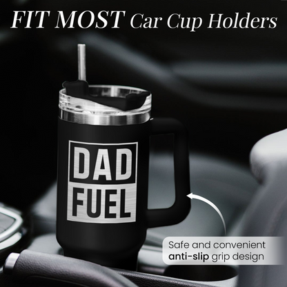 Black 40oz tumbler with handle, DAD FUEL graphic, in car cup holder