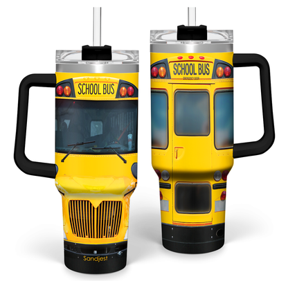 Yellow school bus graphic tumbler with black handle, clear lid, and straw