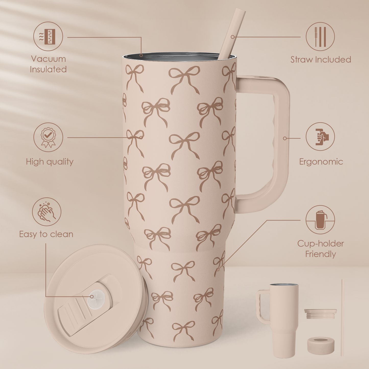 Light tan bow-pattern tumbler with handle and straw included, slide-lid top