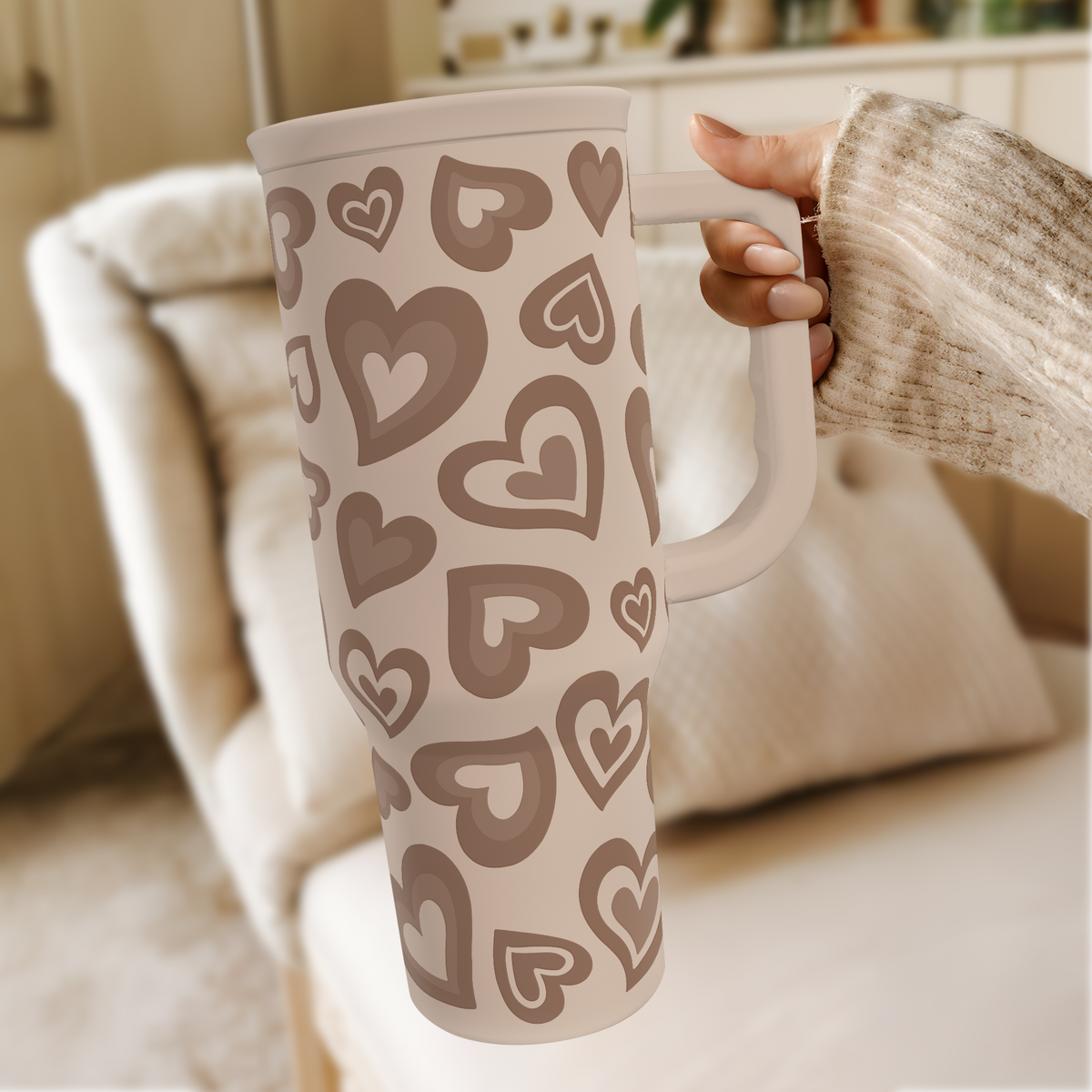 Brown heart-pattern 40oz tumbler with raised handle and straw