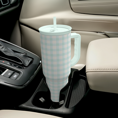Mint gingham insulated tumbler with handle and straw, standing upright