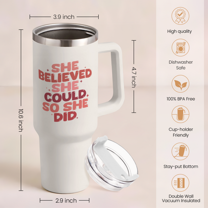 White 40oz tumbler with handle and lid, red slogan graphic.