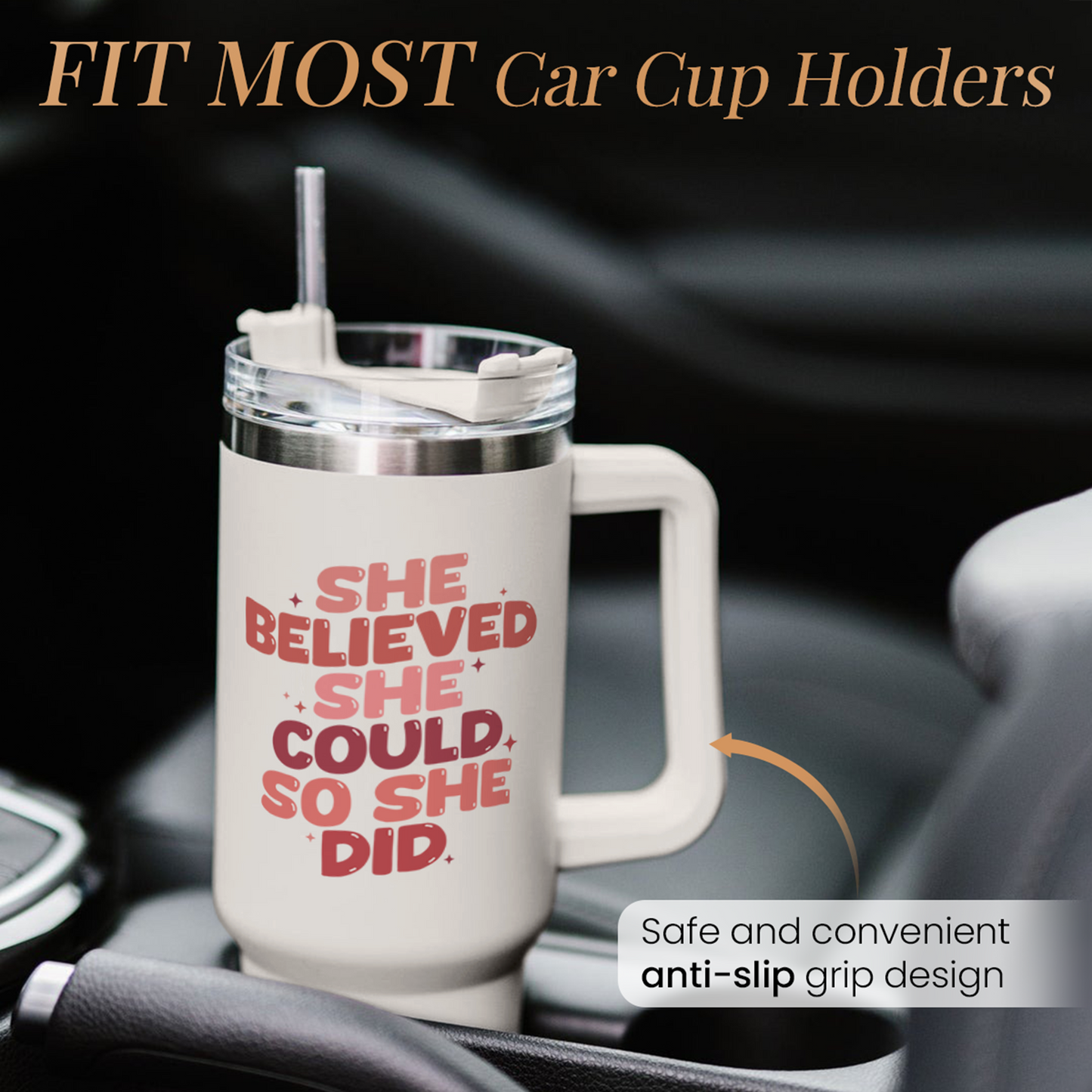 White 40oz tumbler with handle and red slogan graphic in car cup holder.