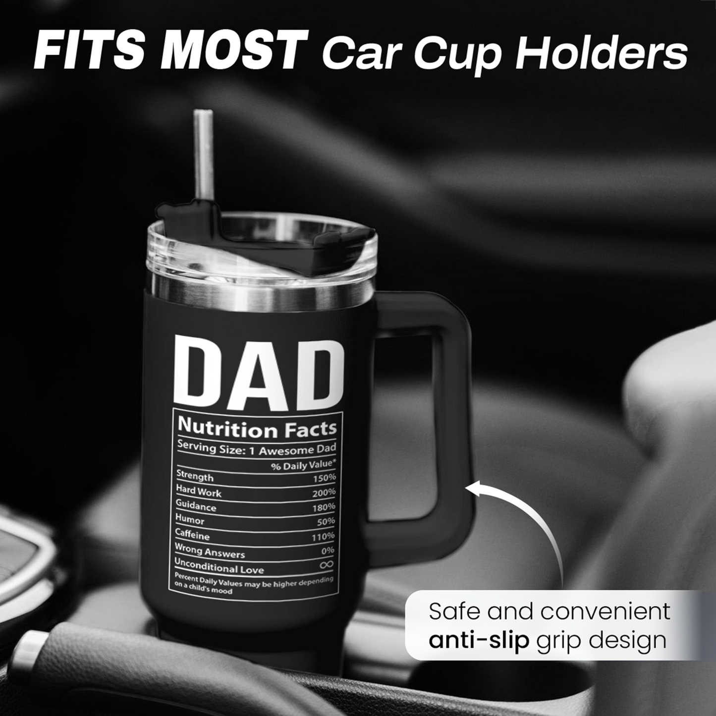 Black 40oz tumbler with handle and straw, “DAD Nutrition Facts” label, car cup holder view