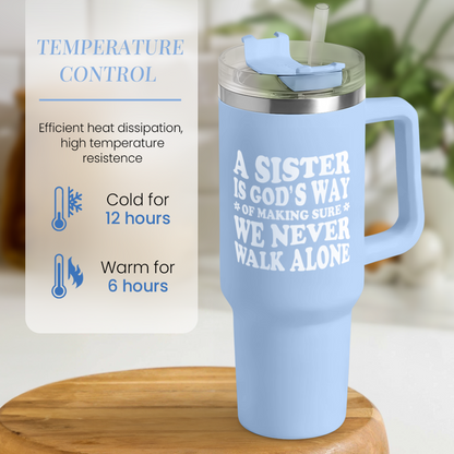 Light blue 40oz tumbler with handle and straw lid; “A SISTER…” quote graphic on front