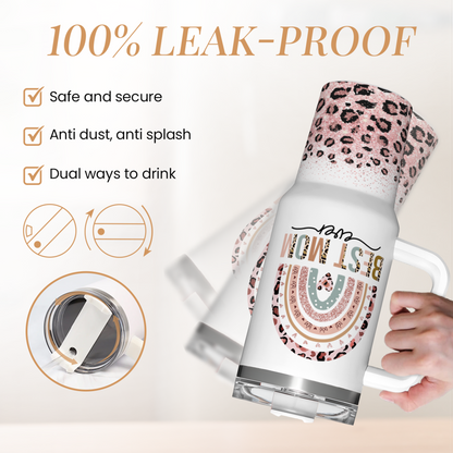 White leak-proof tumbler with straw lid; leopard-print base and rainbow Best Mom graphic