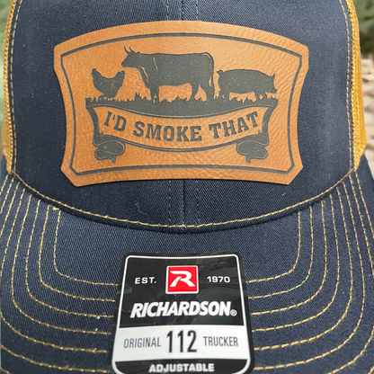 Navy trucker cap with leatherette logo patch and Richardson Original 112 adjustable badge