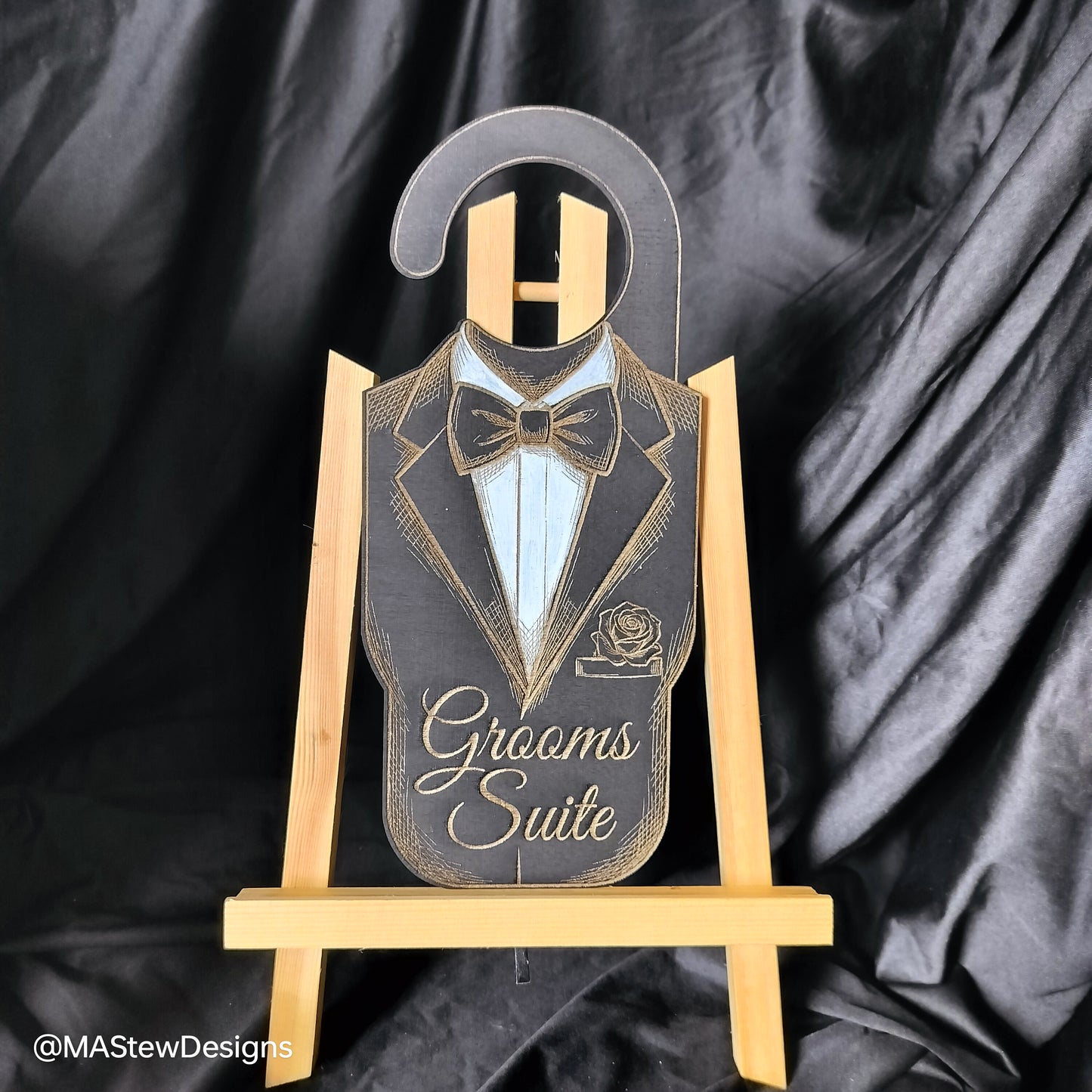 Laser-engraved wood door hanger with tuxedo silhouette and 'Grooms Suite' text.