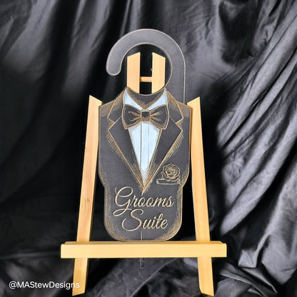 Laser-engraved wood door hanger with tuxedo silhouette and 'Grooms Suite' text.