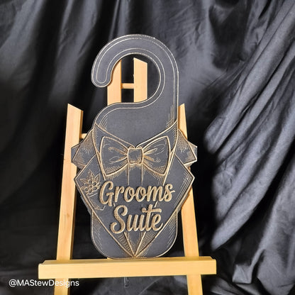Laser-engraved wood door hanger with bow tie tuxedo design and 'Grooms Suite' text.