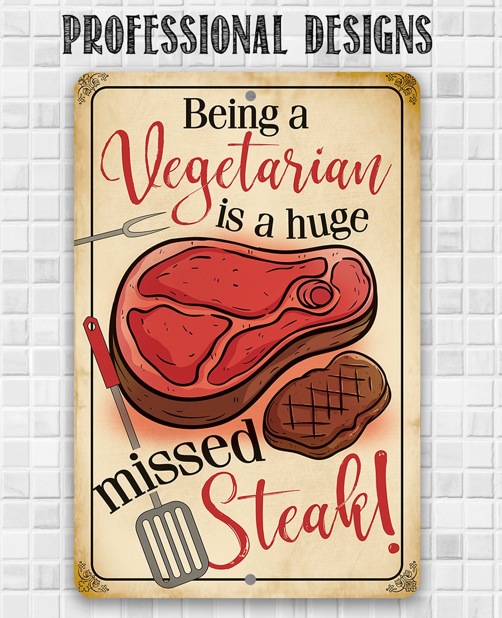 Vegetarian slogan metal sign with red steak and brown grill steak, gold-framed vintage print.