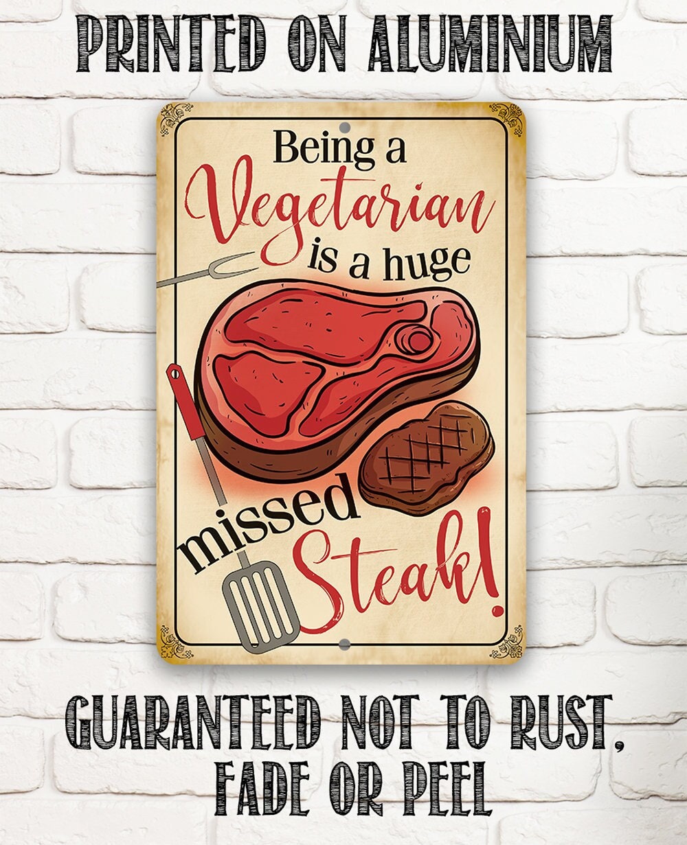 Vegetarian slogan metal sign labeled printed on aluminum, red steak and tools graphic.