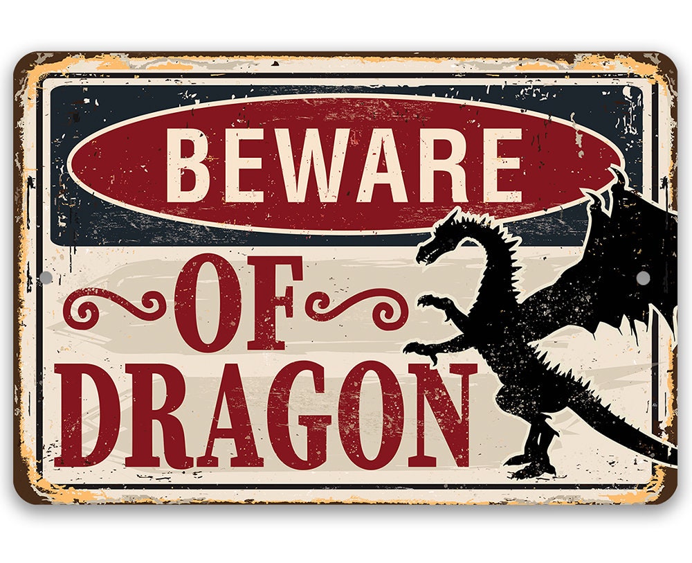Rectangular metal sign reading “BEWARE OF DRAGON” with dragon silhouette graphic