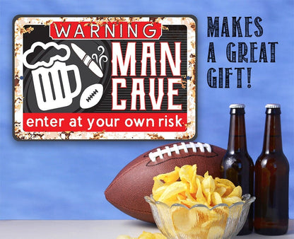 Warning “Man Cave” metal sign reading “Enter at your own risk” with icon graphics