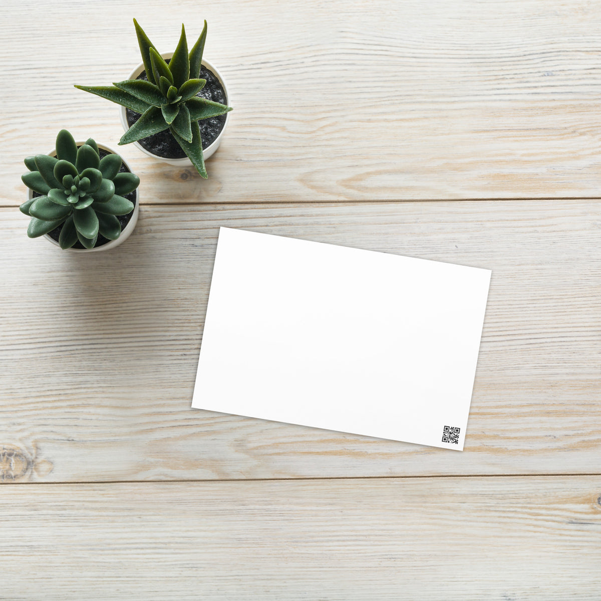 Blank greeting card back with small barcode-style mark in the bottom-right corner