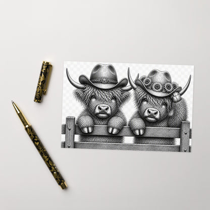Highland cow couple greeting card illustration with cowboy hats on a wooden fence