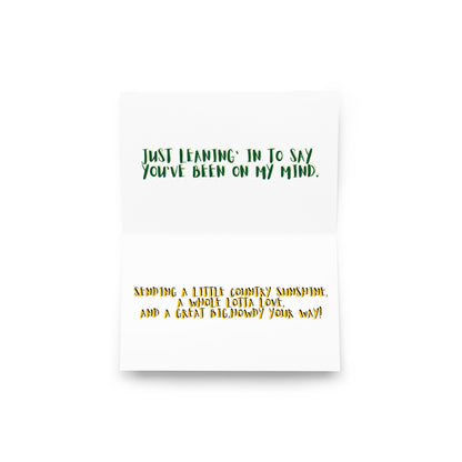 Closed greeting card with green top quote and orange bottom verse