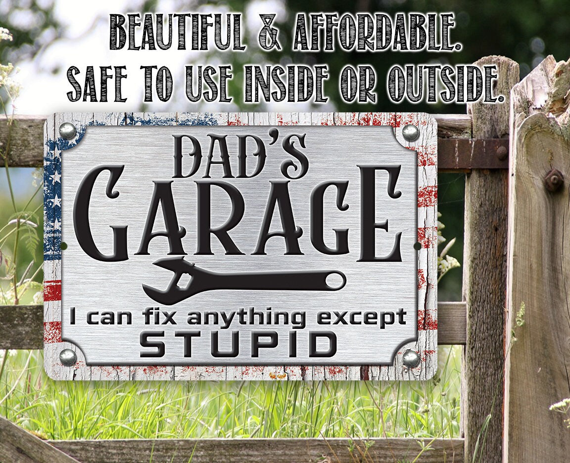 Aluminum Dad’s Garage metal sign with stars stripes border and "I can fix anything except STUPID"