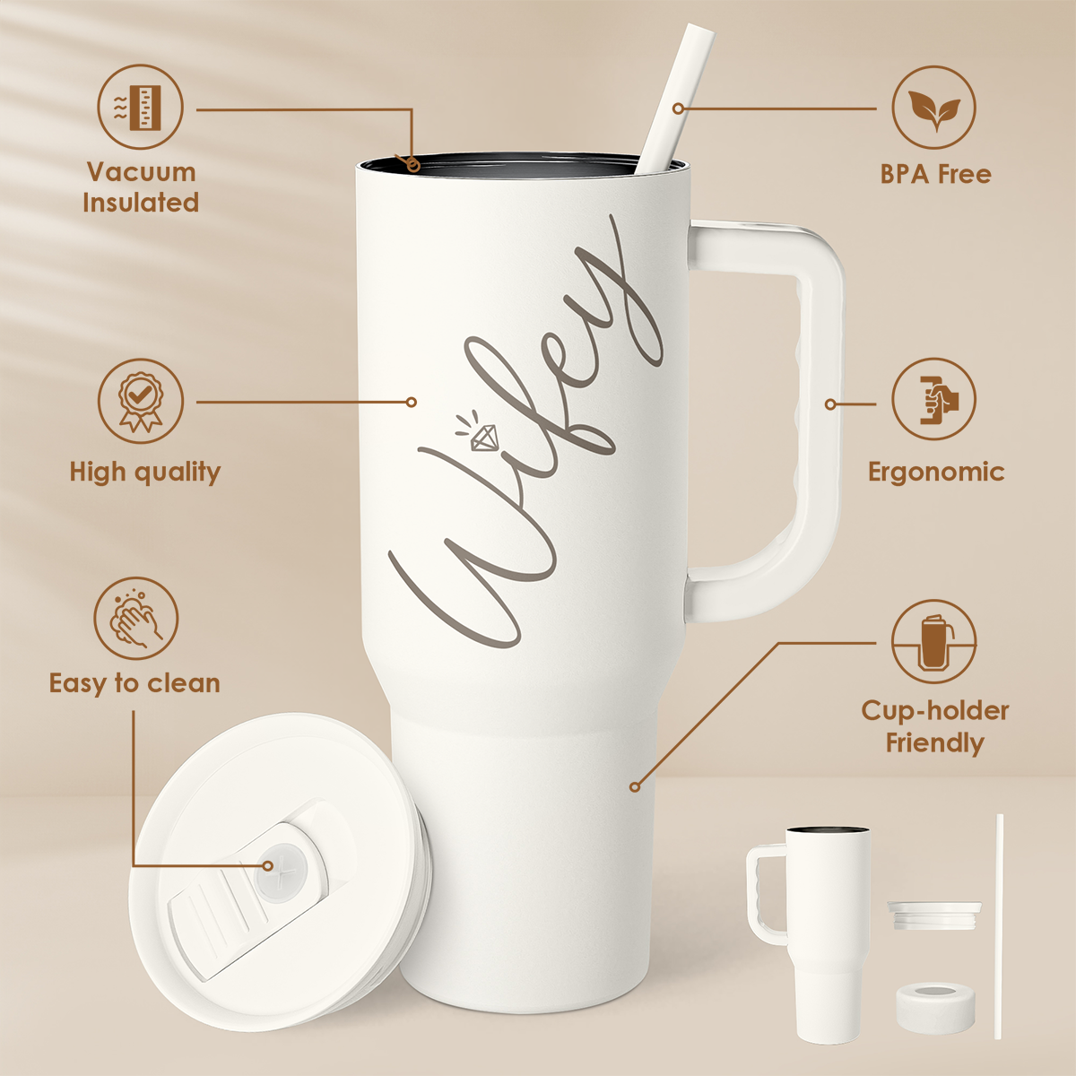 White slide-lid tumbler with handle and straw, wife print and cup-holder features shown