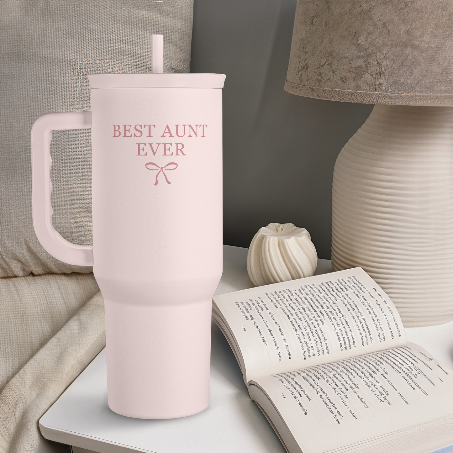 Pink 40oz slider tumbler with handle and straw; “Best Aunt Ever” logo on front
