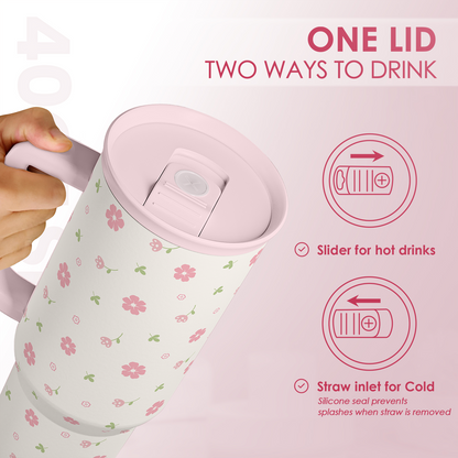 Pink floral 40oz tumbler with slide lid for straw inlet and hot-drink opening