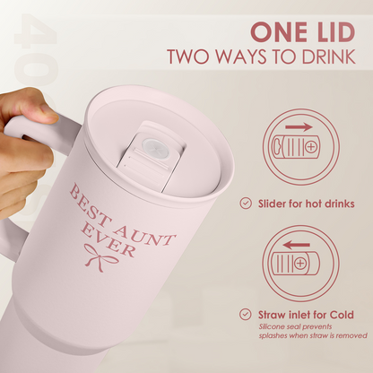 Pink 40oz tumbler with handle, lid open for slide hot/straW cold use; “Best Aunt Ever”