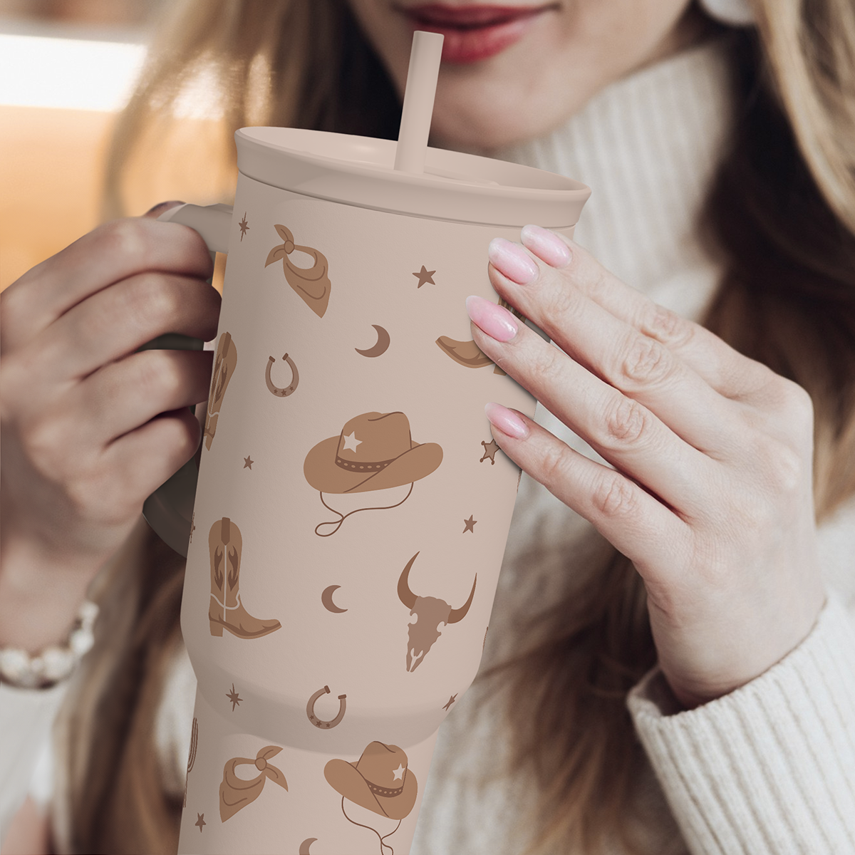Cowgirl slider tumbler with handle and straw, tan cowboy pattern on the cup