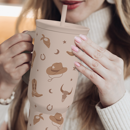 Cowgirl slider tumbler with handle and straw, tan cowboy pattern on the cup