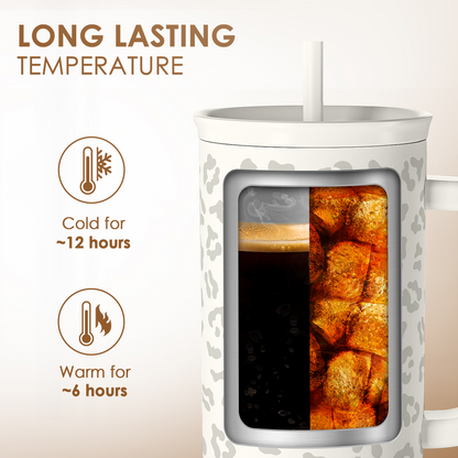 40oz white tumbler with gray leopard print and straw, window shows drinks