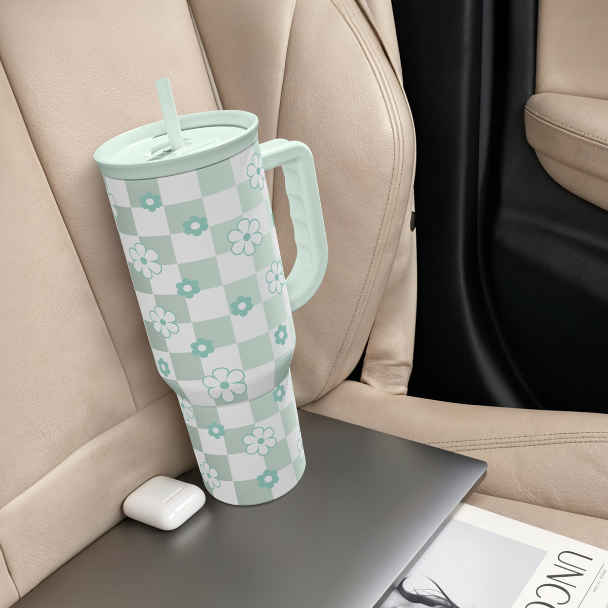 40oz mint checker daisy tumbler with handle and straw standing upright