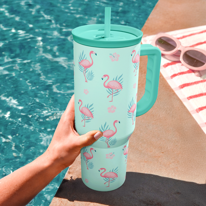 Mint Slidemate slider tumbler with handle, held in hand, pink flamingo pattern